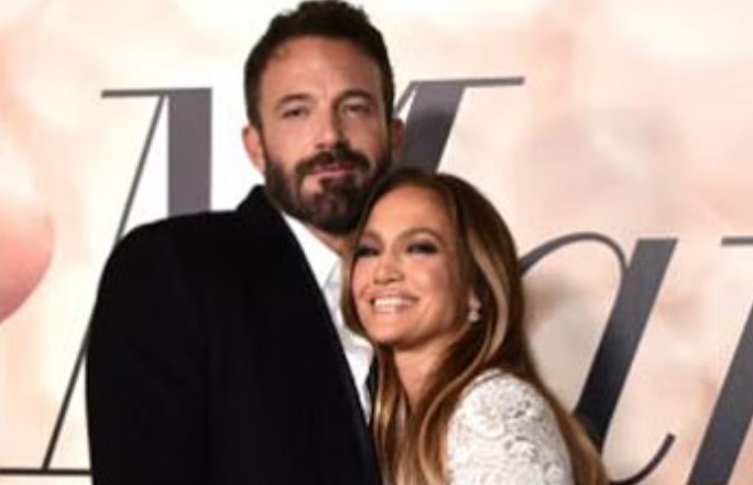 JLo introduces herself as Jennifer Lynn Affleck, and Ben Affleck is beaming